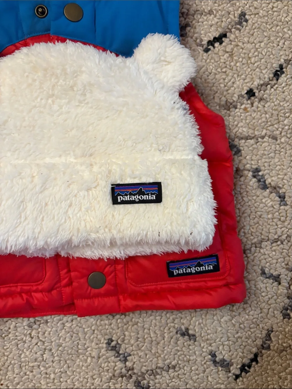 Patagonia Kids Red and Blue Puffer Vest with White Fuzzy Hat 6/12m